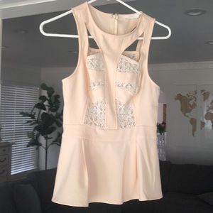 Lush peplum top with embroidered lace detail